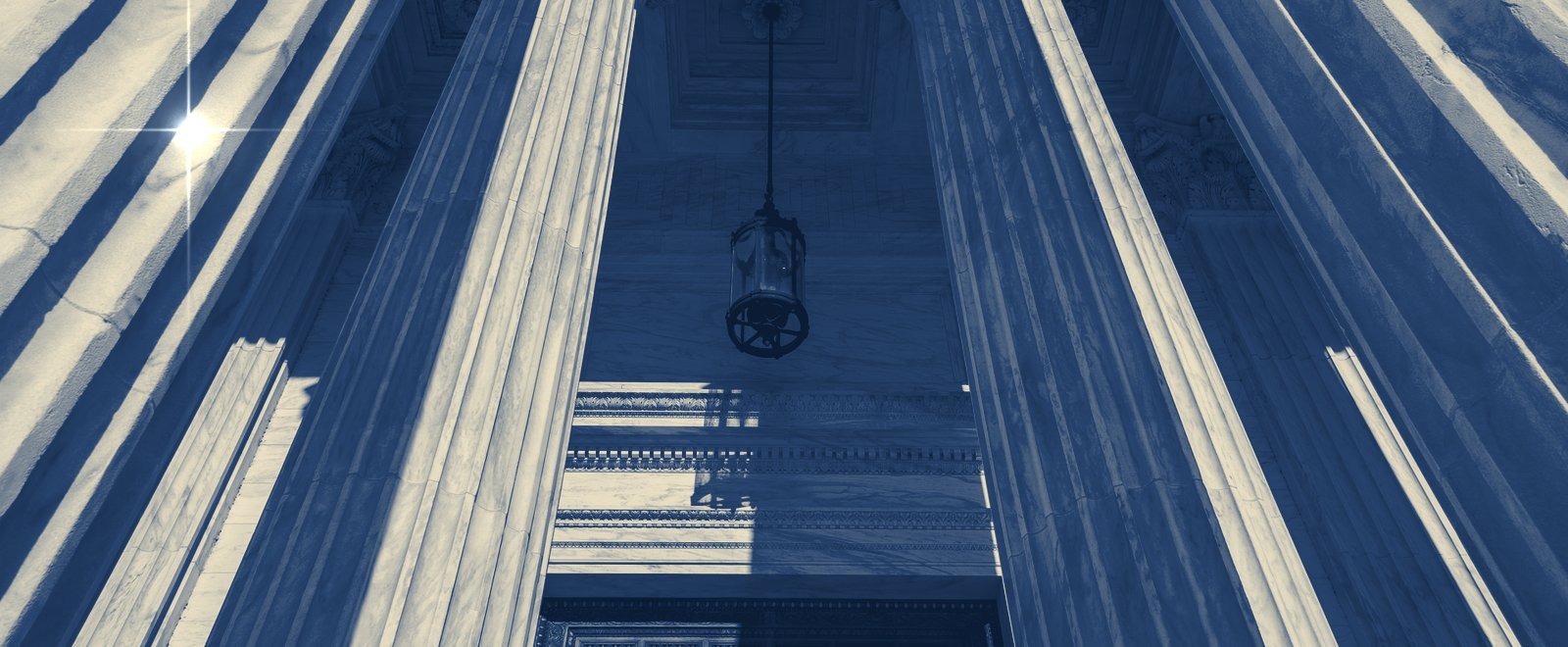 Classical courthouse columns, representing tax law and planning