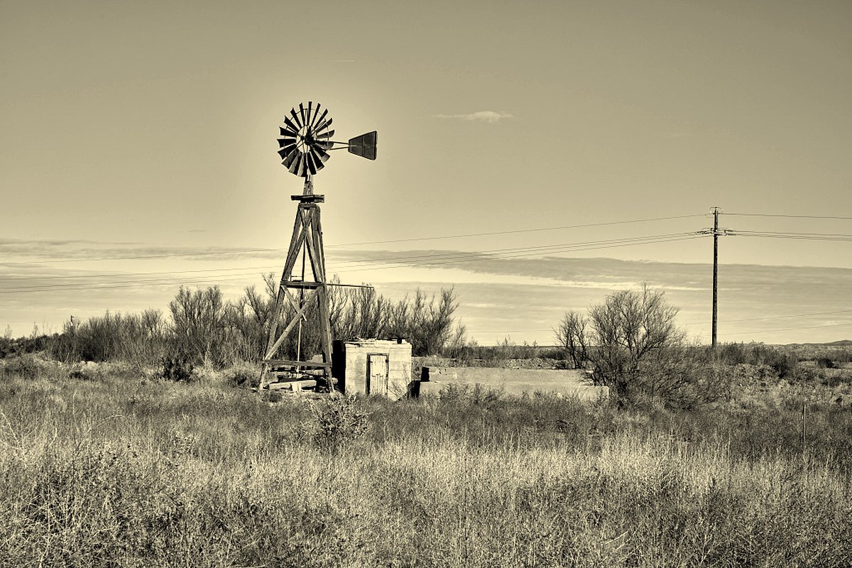 An old windmill on dry rangeland near San Antonio and Socorro, New Mexico