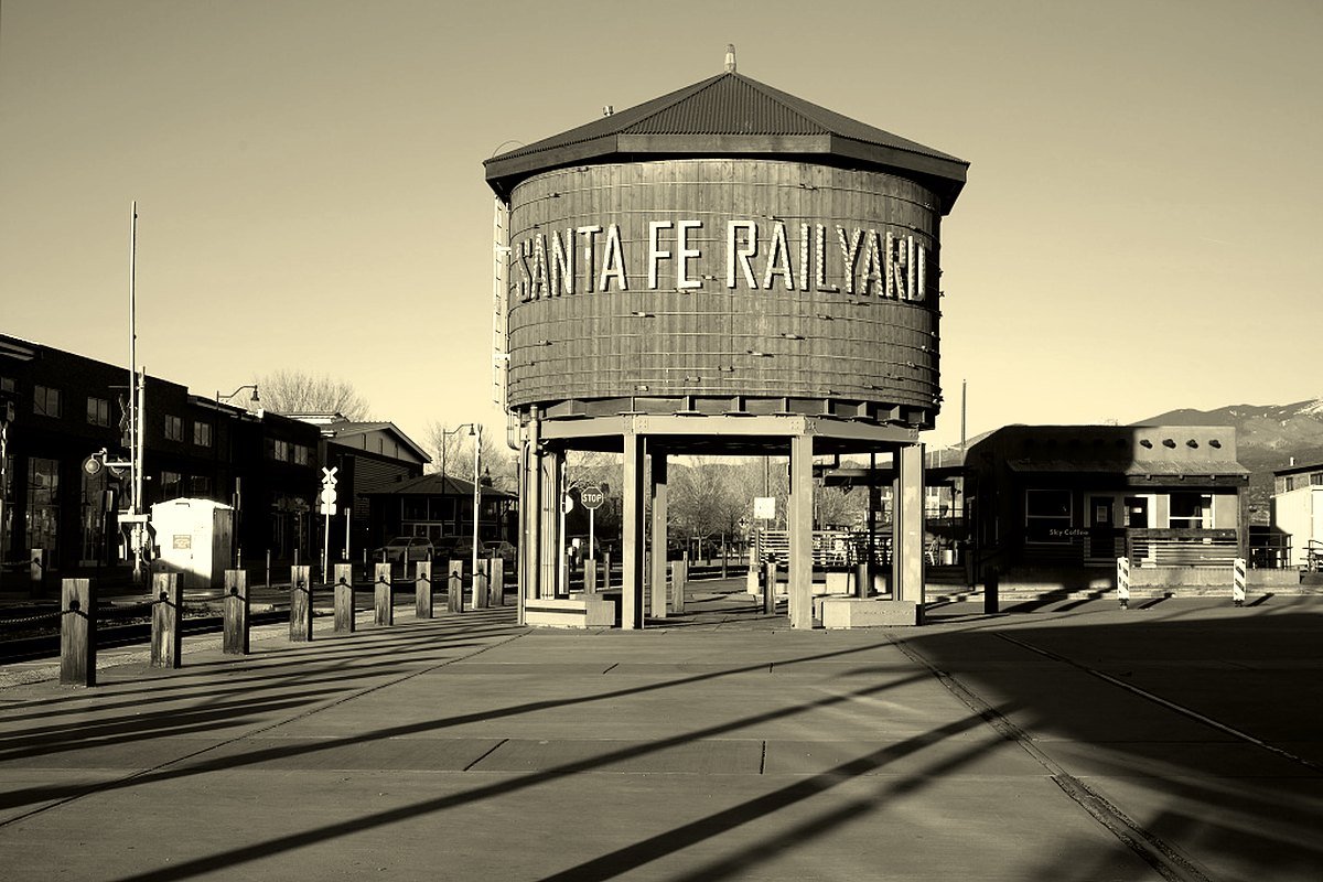 The refurbished old water tower lettered Santa Fe Railyard, a landmark of the Railyard District in Santa Fe, New Mexico