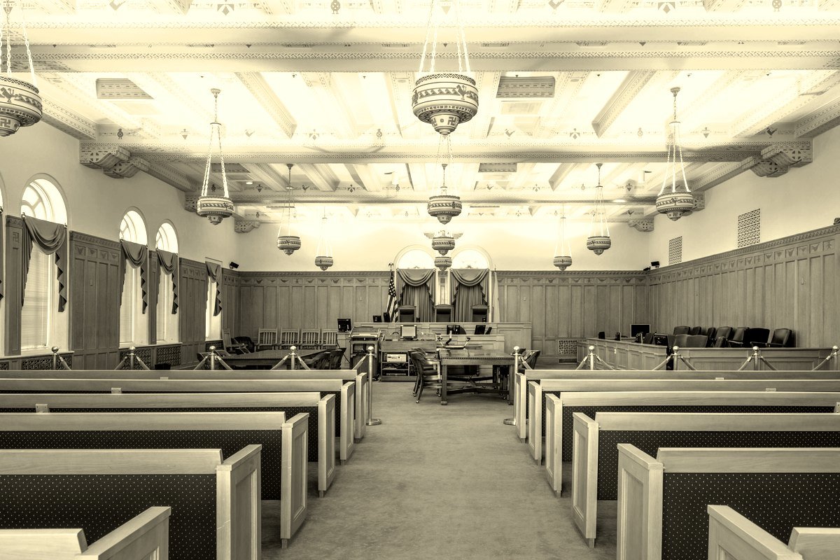 A historic federal courtroom in the 1930 U.S. Courthouse in Albuquerque, New Mexico, looking toward the bench